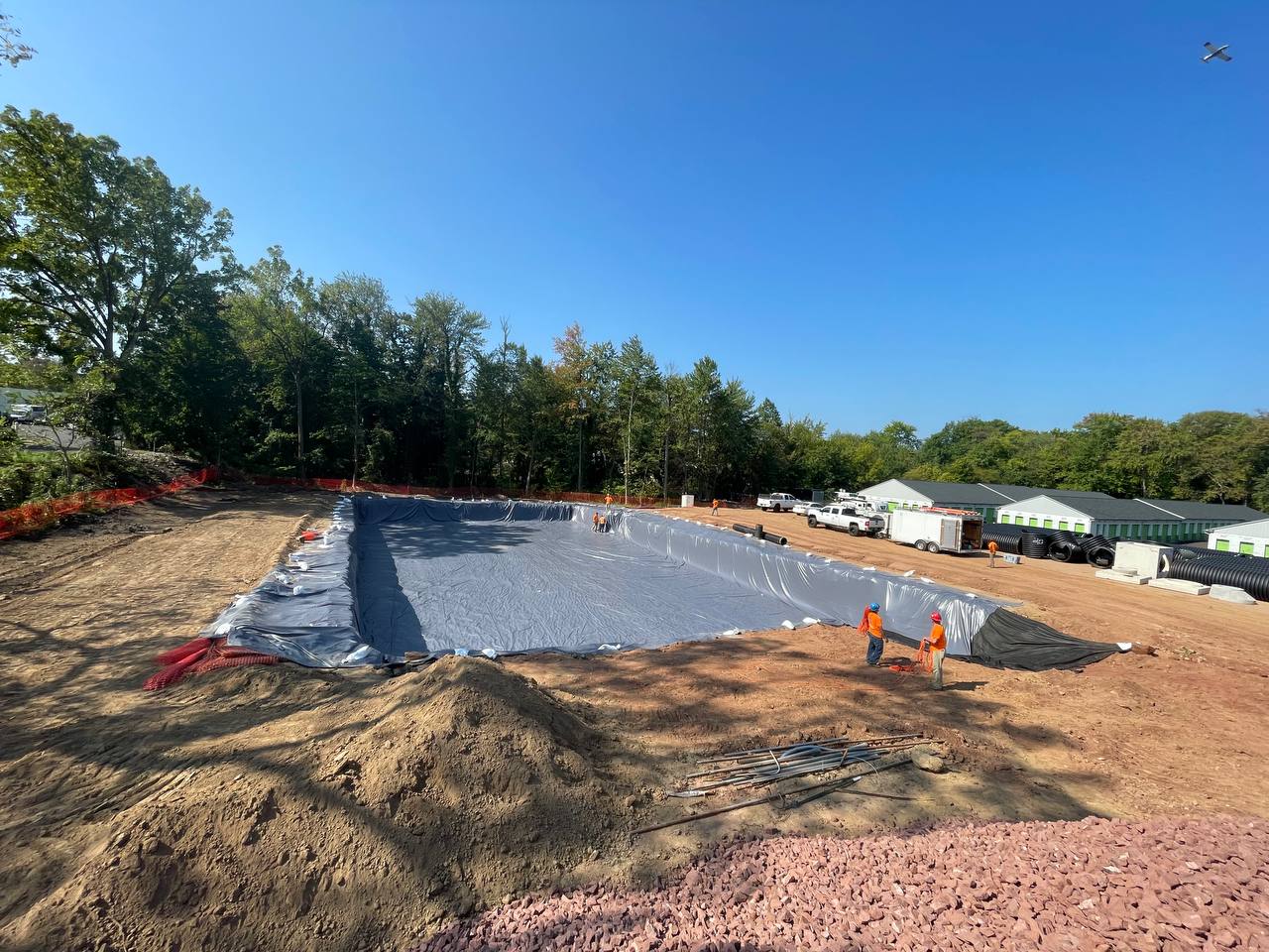 Geomembrane installation crew at work